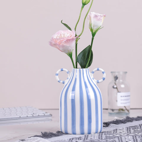oliruim ceramic vase with flowers in a modern kitchen