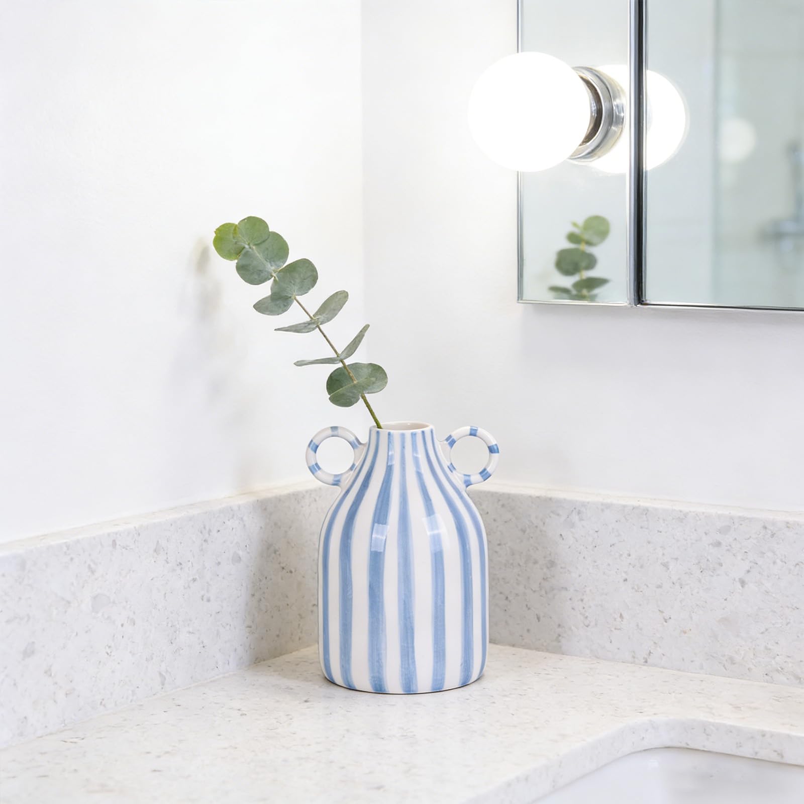 oliruim vase close-up showing textured glaze and hand-painted stripes