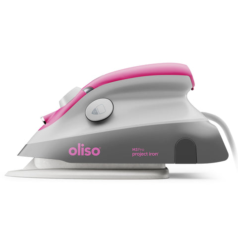 OLISO M3Pro raspberry compact design for easy press beside sewing machine.