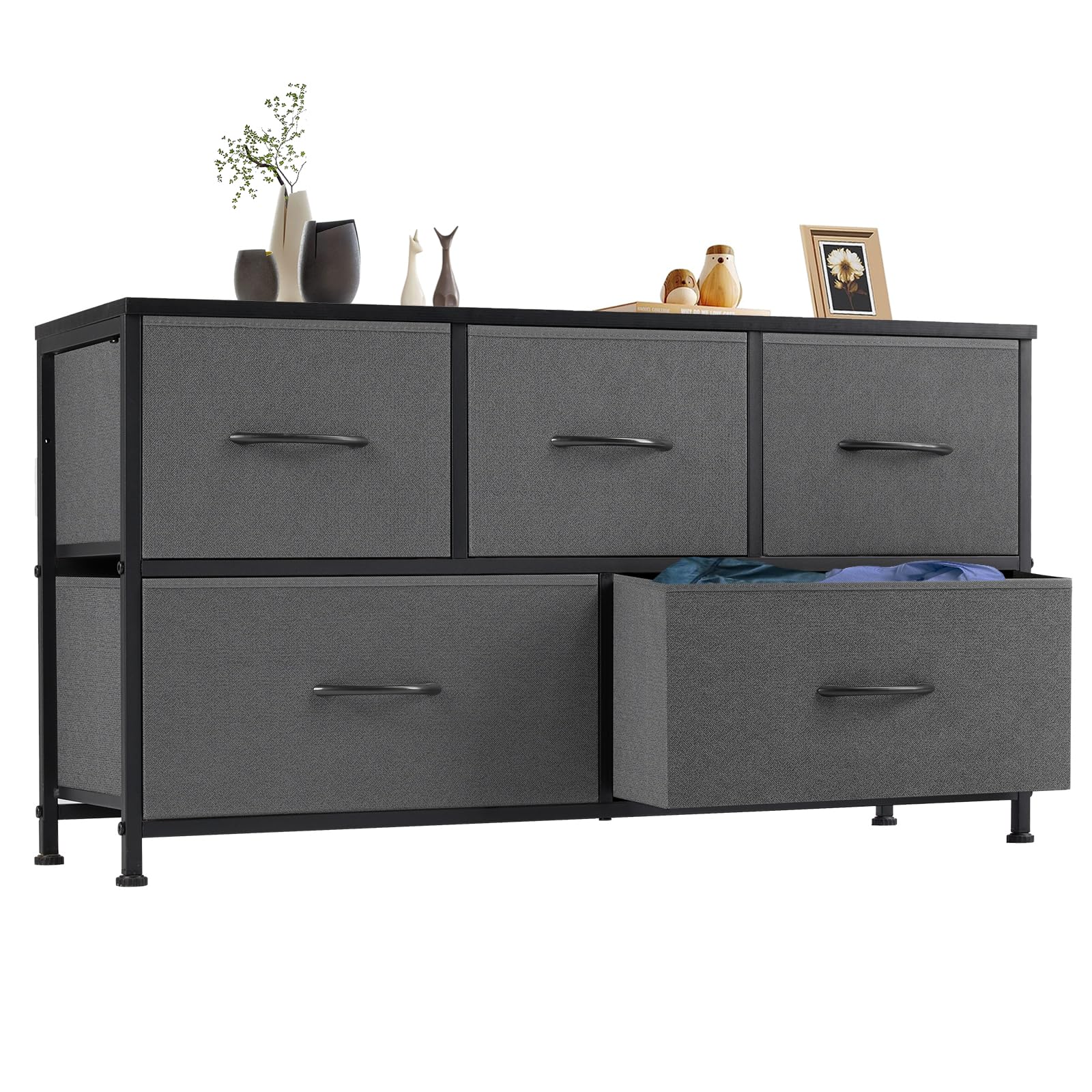 OLIXIS dresser with five drawers shown in a bedroom, an organized storage solution.
