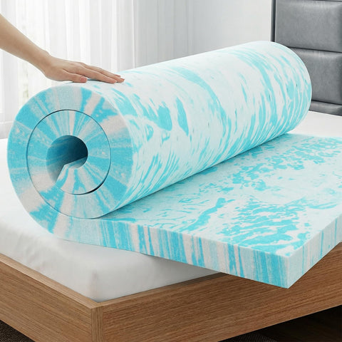 OLIXIS gel memory foam topper on a bed for cooling comfort and support.
