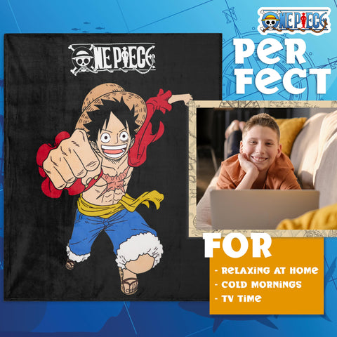 One Piece blanket on a sofa creates inviting cozy space for movie nights.