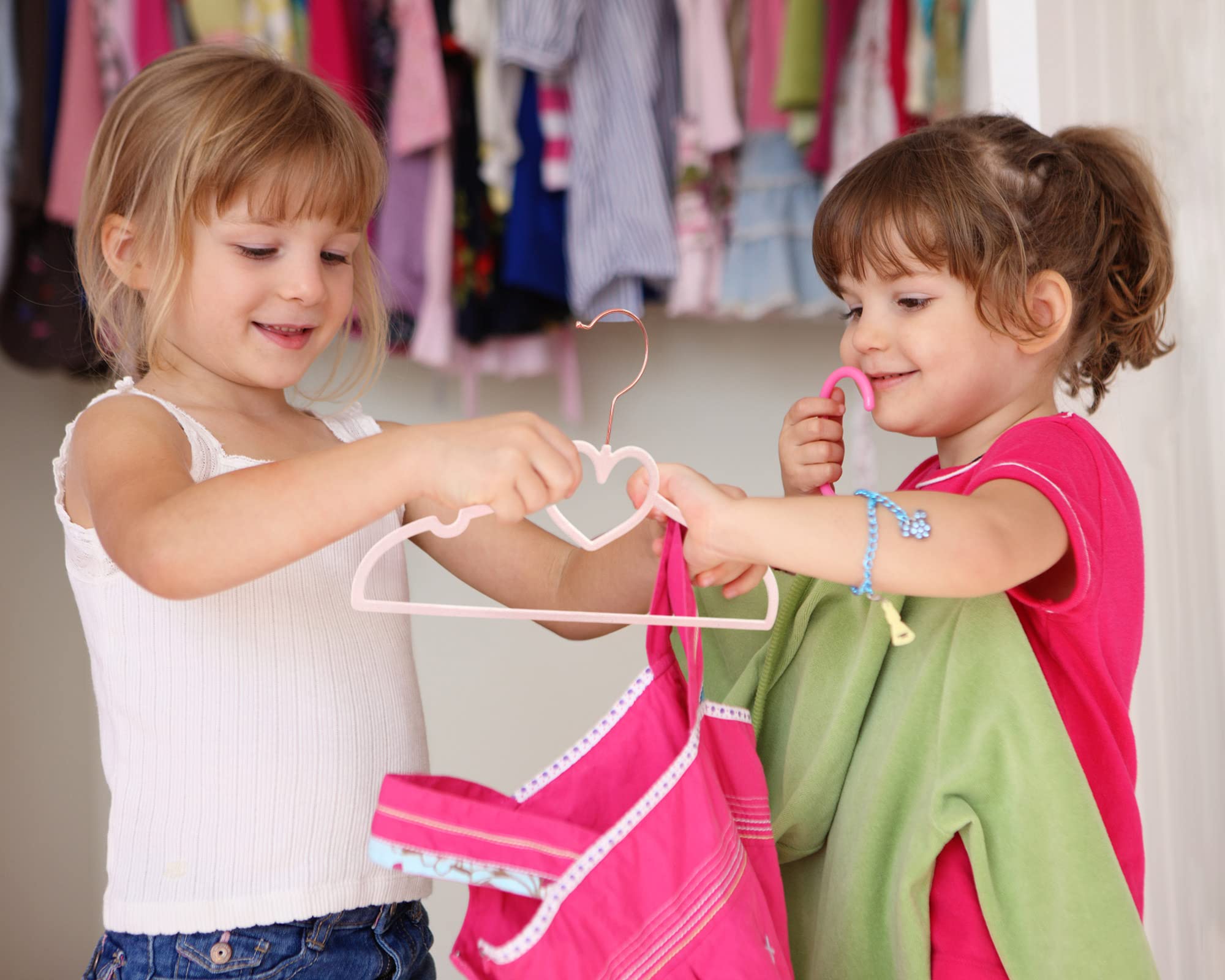OneDream Pink Heart Velvet Hanger with notched shoulders supports delicate tops without slipping
