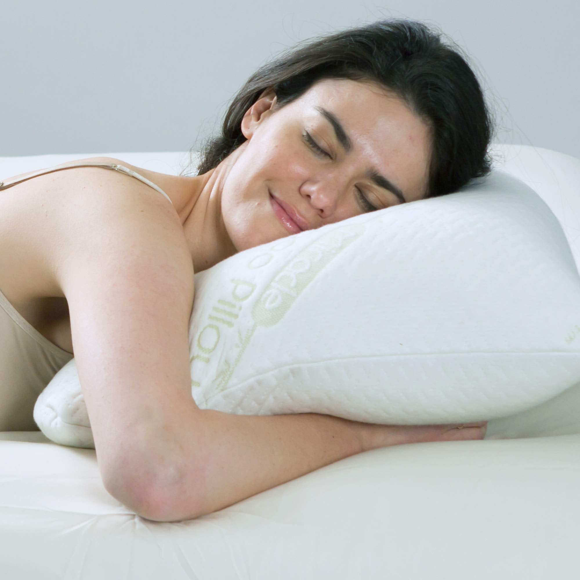 Ontel Miracle Pillow on bed scene showing plush contouring and size