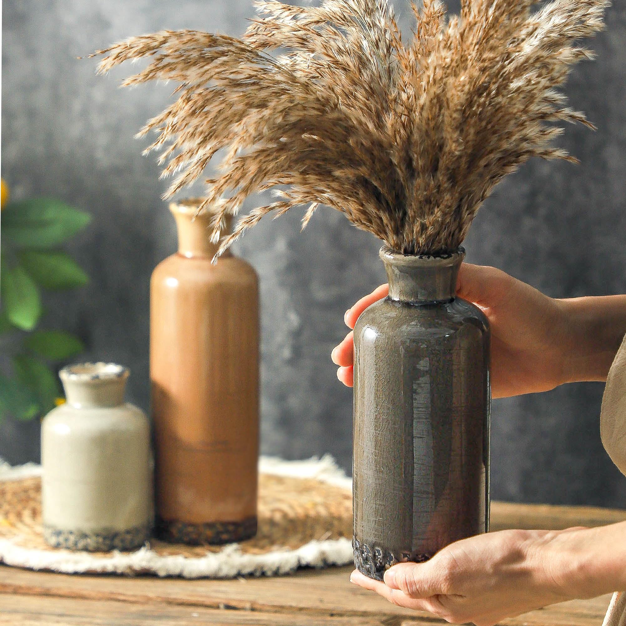 OOIT vase trio on mantel display in neutral brown for stylish decor.