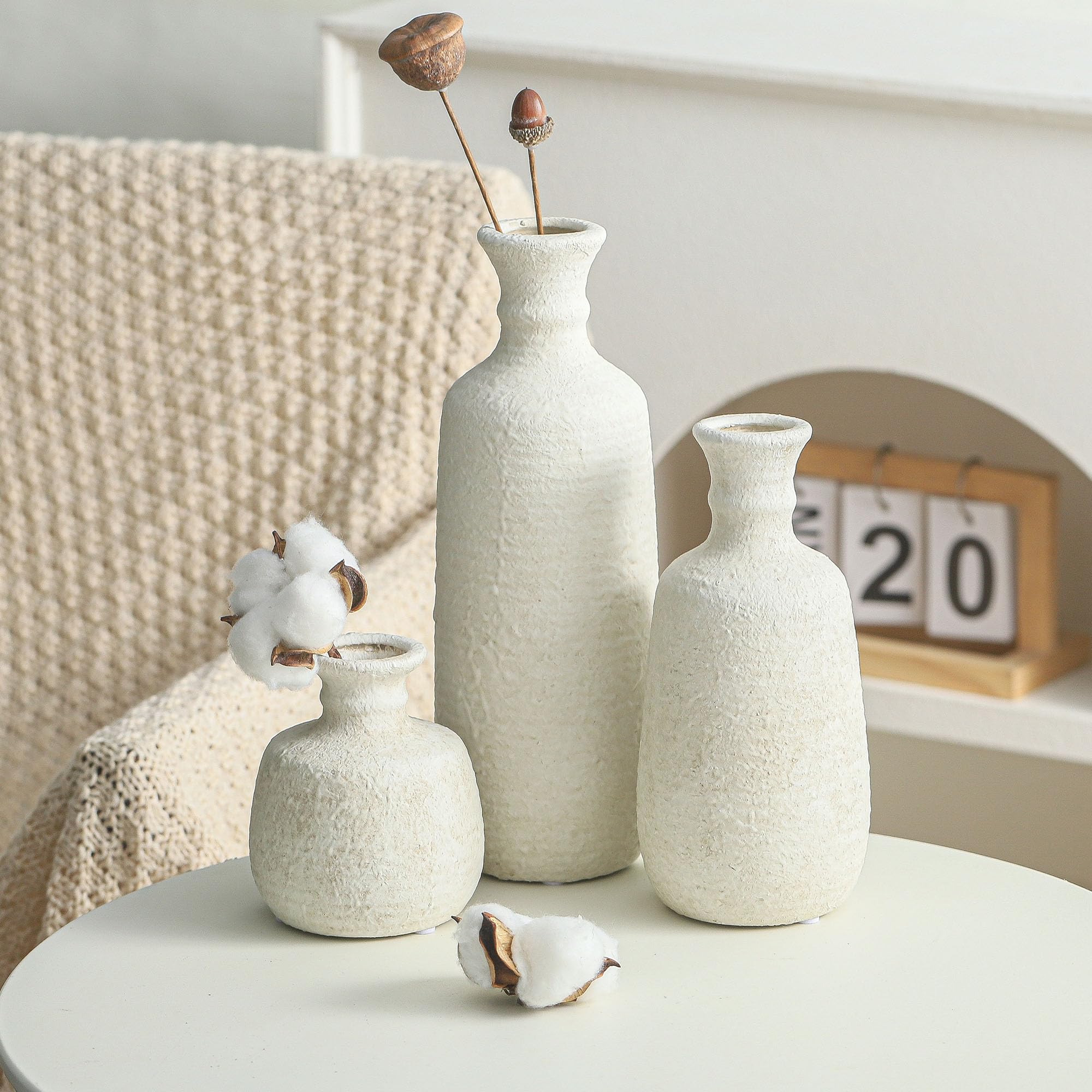 OOIT vases trio in varied heights, ideal for layered shelf display.