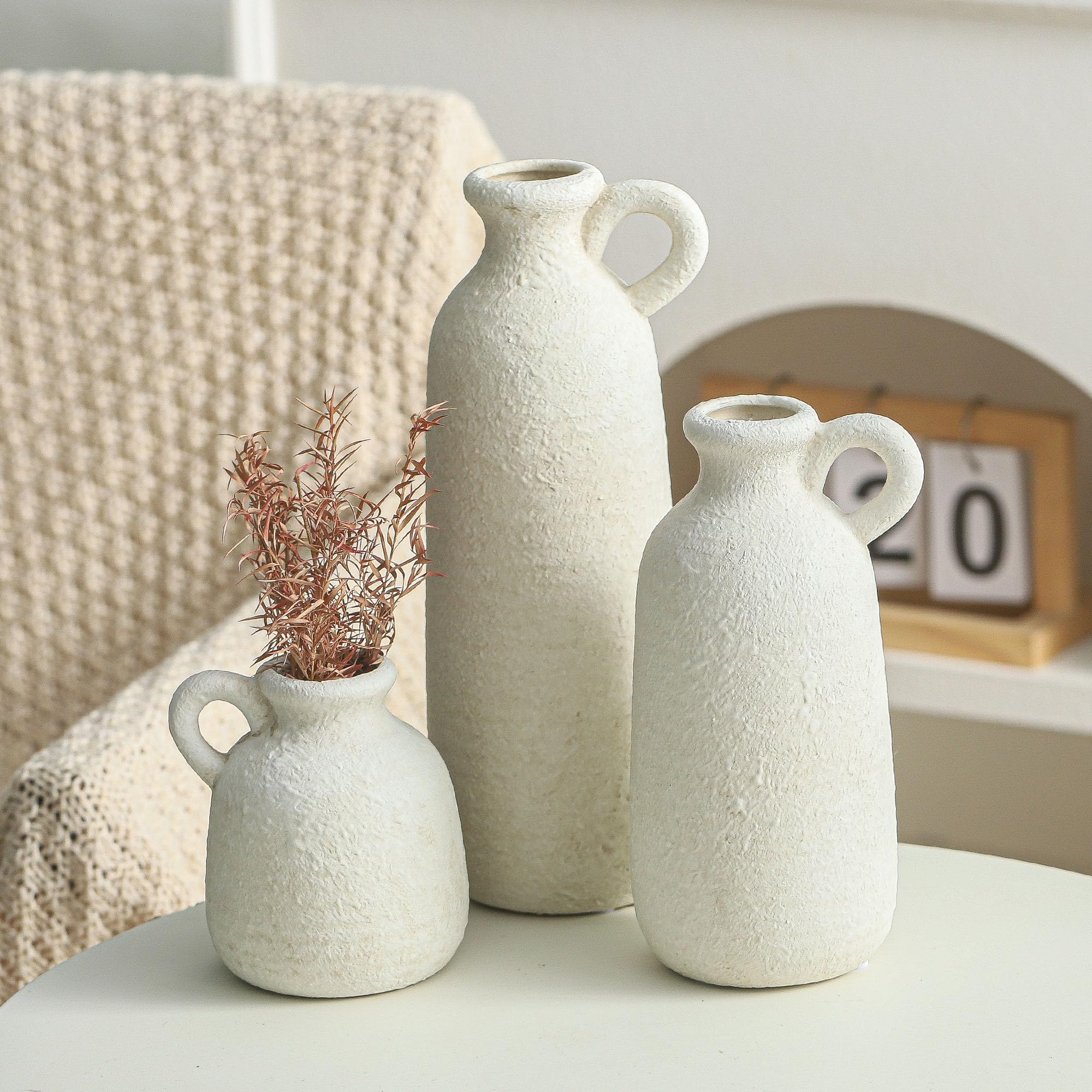 Vases with greenery highlighting compact sizes