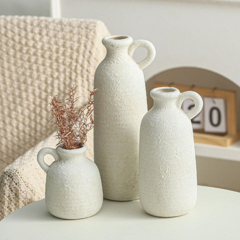 Vases with greenery highlighting compact sizes