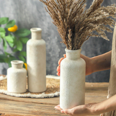 ooit ceramic vases on shelf, varied shapes for stylish vignette