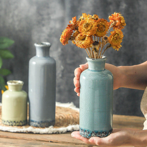 OOIT rustic farmhouse vases in varying shapes add texture to shelves.