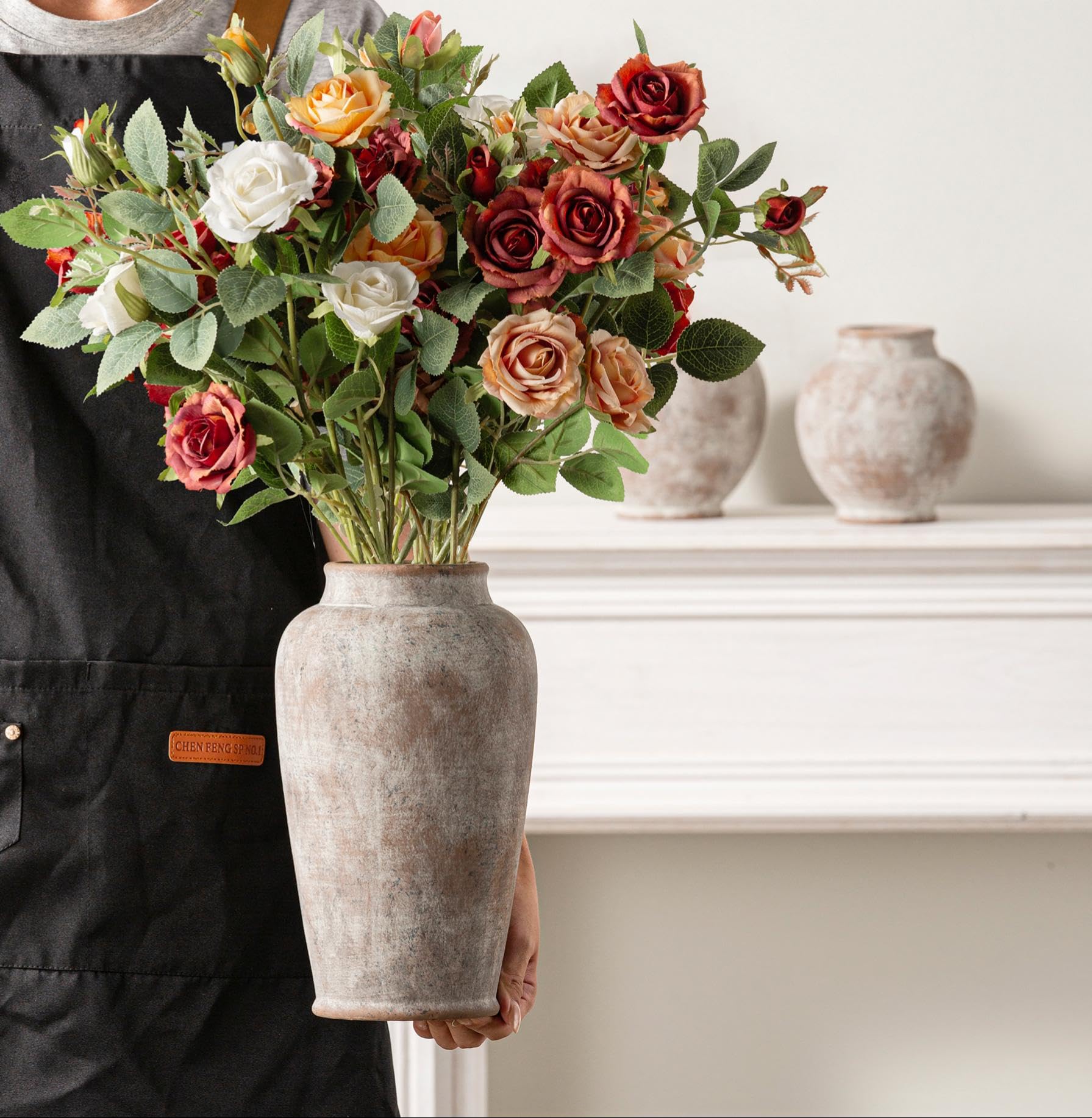 OOIT vase with waterproof interior coating supports fresh or artificial stems.