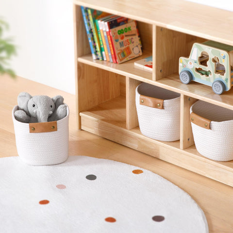 OOOK white cotton baskets with smooth surface for clutter-free shelves.