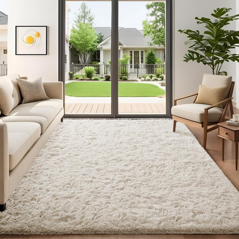 Ophanie 5x7 ivory plush surface rug adds cozy comfort to living rooms.