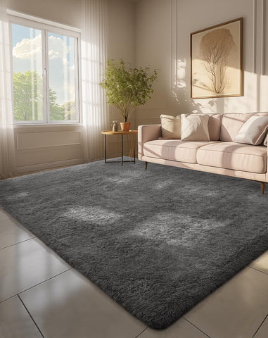 Ophanie 6x9 rug with soft shaggy gray texture adds cozy comfort to living rooms.