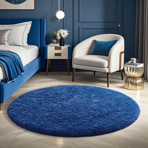 Ophanie blue round rug surface closeup shows plush softness for barefoot comfort.
