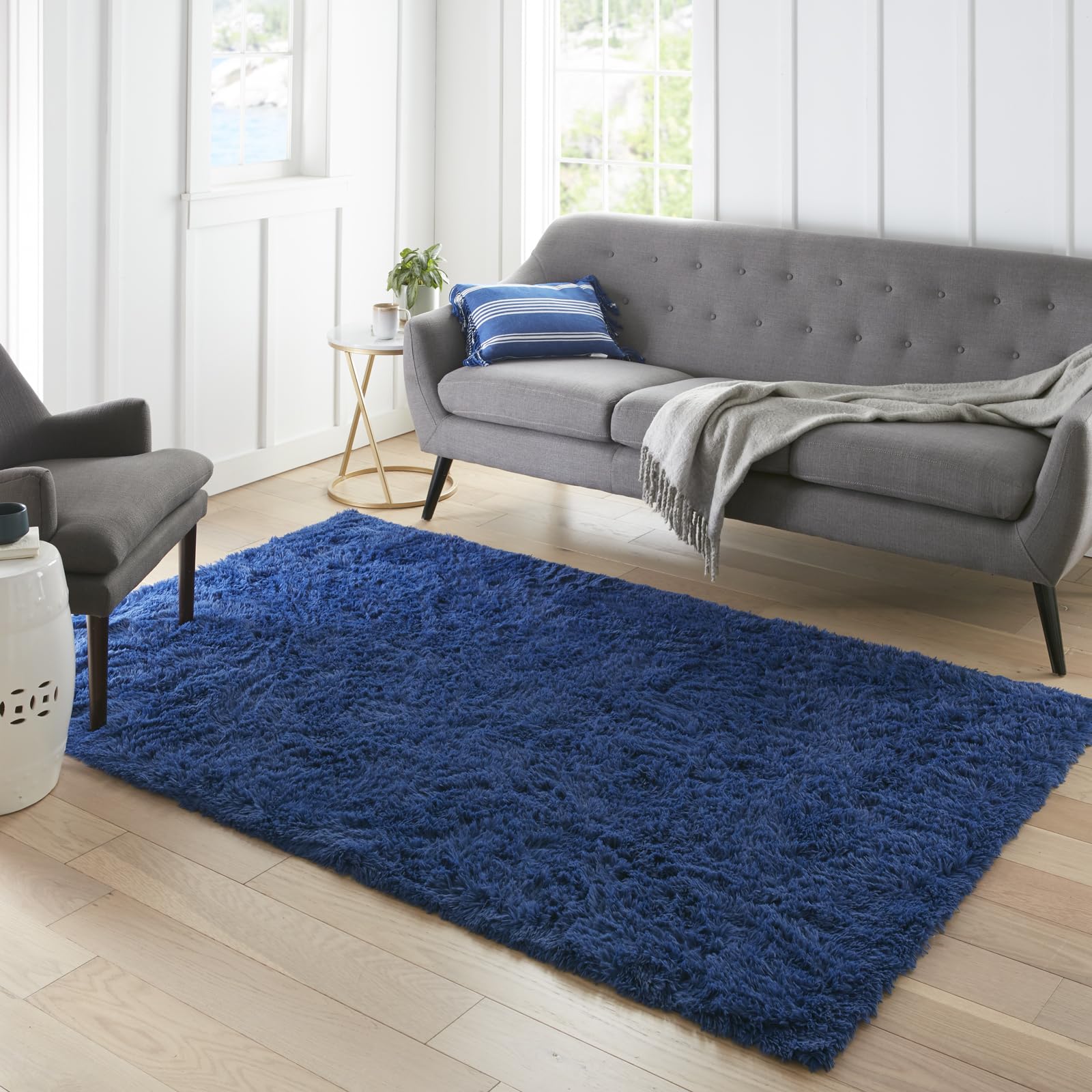Ophanie blue rug in navy for kids' bedroom with soft shag underfoot