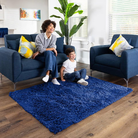 Ophanie Blue Rug in navy enhances nurseries with warm, layered decor.