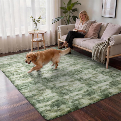 Ophanie green-white rug adds warmth and style to any room.