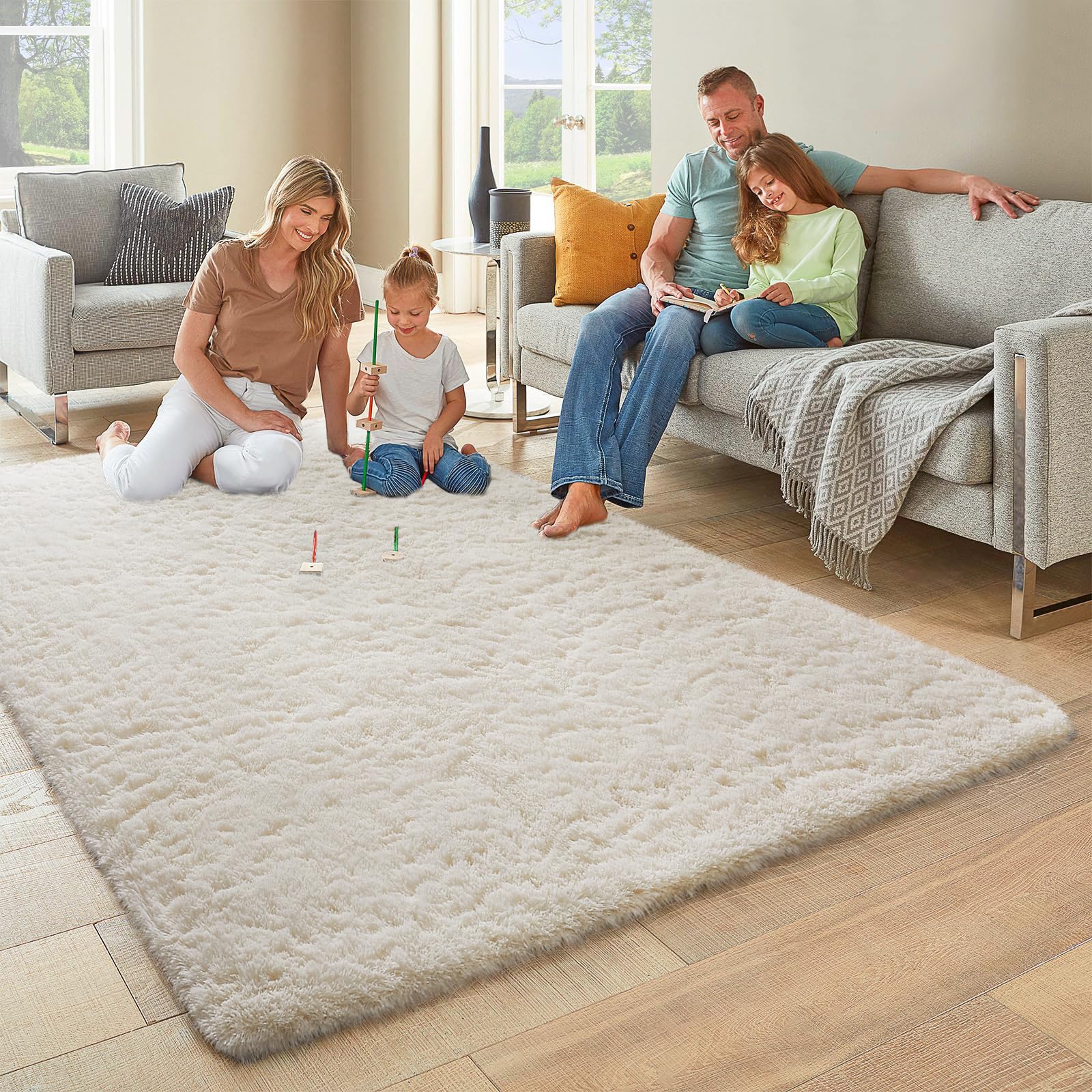 Ophanie ivory color soft plush rug feels gentle under bare feet.