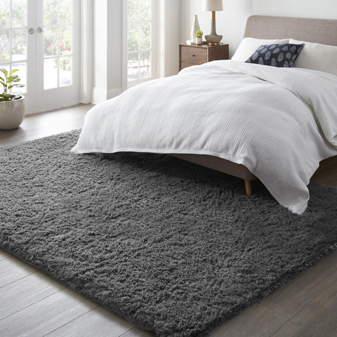 Ophanie layered-design shag rug enhances hygge-style warmth and space definition.