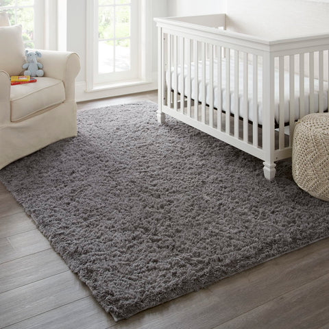 Ophanie living room and nursery rug creates cozy ambience with durable fibers.