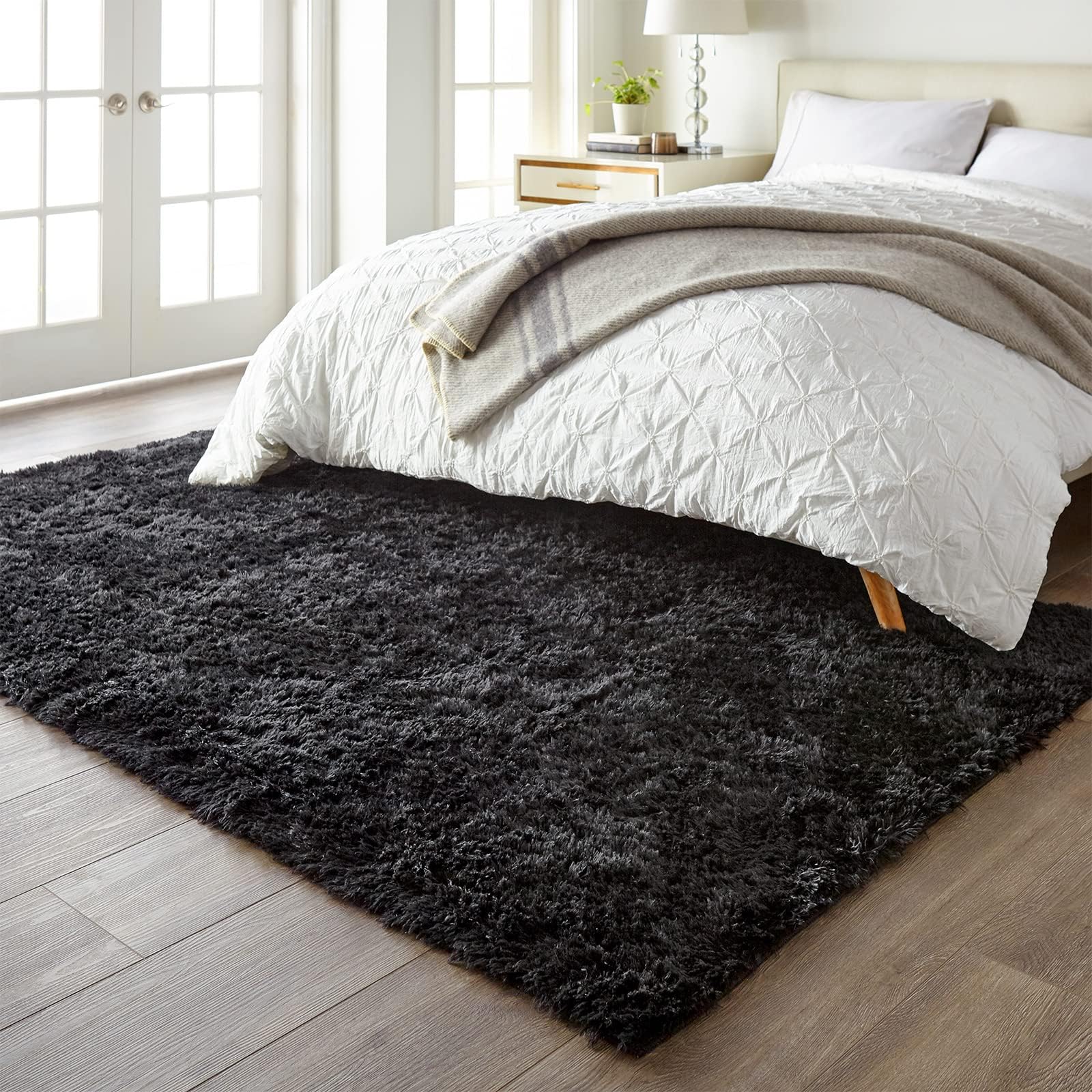 Ophanie non-slip bottom rug helps keep it in place on smooth floors