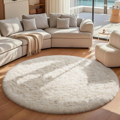 Ophanie nursery round rug provides safe, non-slip surface for babies.