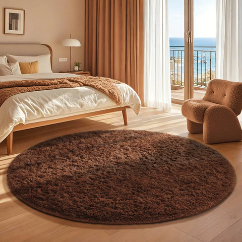 Ophanie round rug bedroom decor emphasizes cozy atmosphere and barefoot-friendly softness.