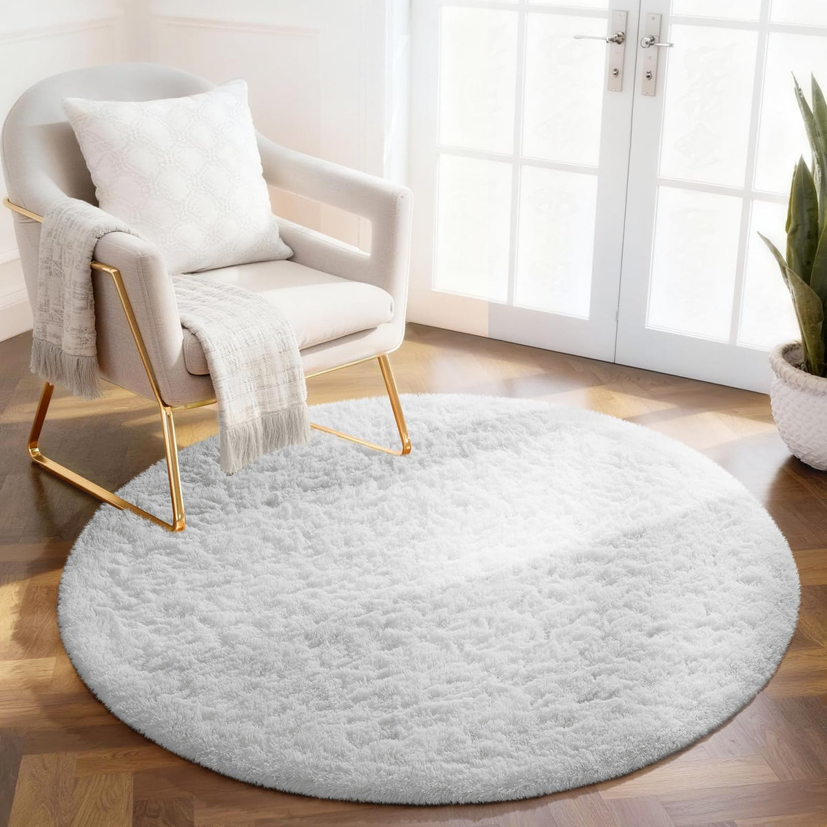 Ophanie white round rug 4ft top view with plush shag for cozy living spaces