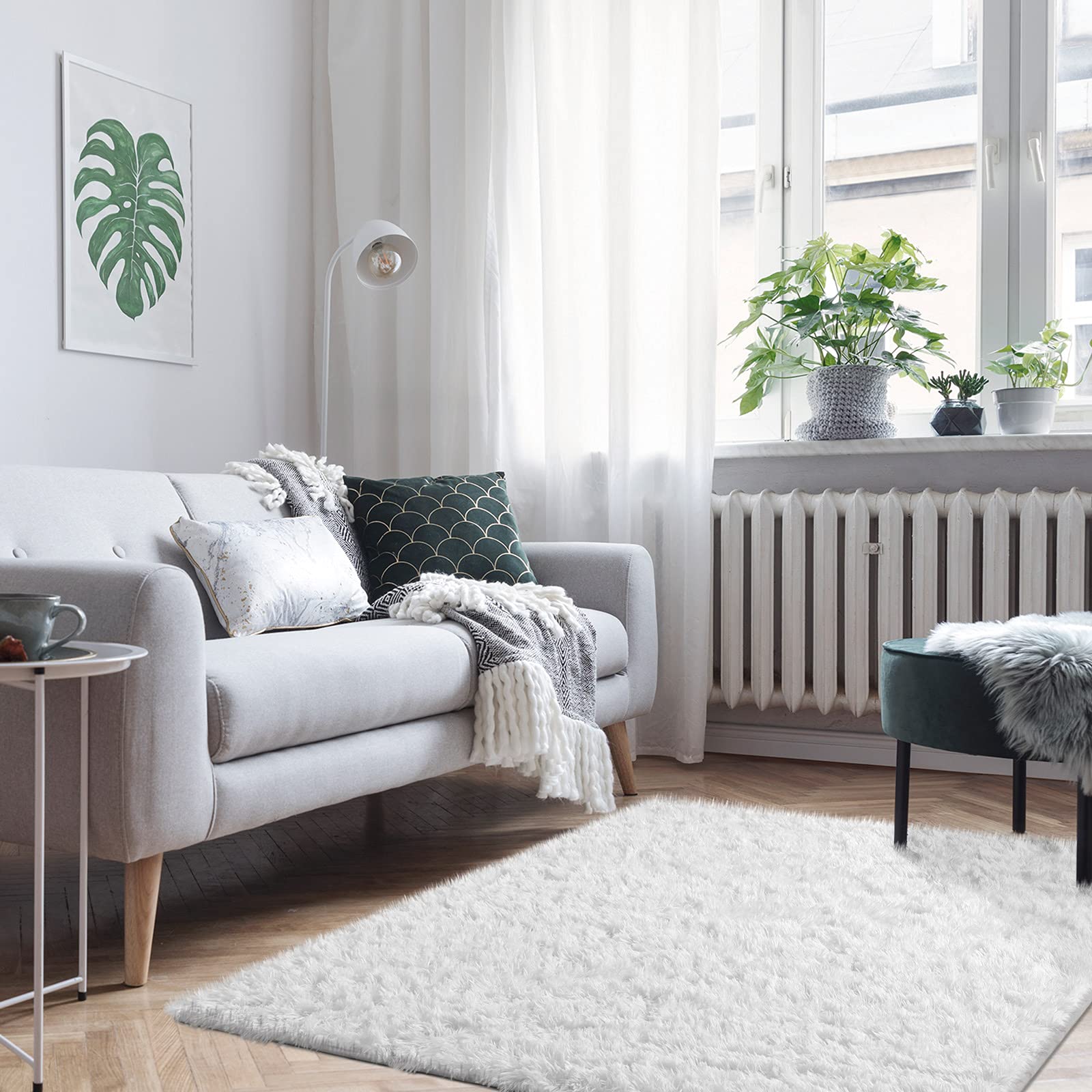 Ophanie White Rug layered for hygge-inspired decor.