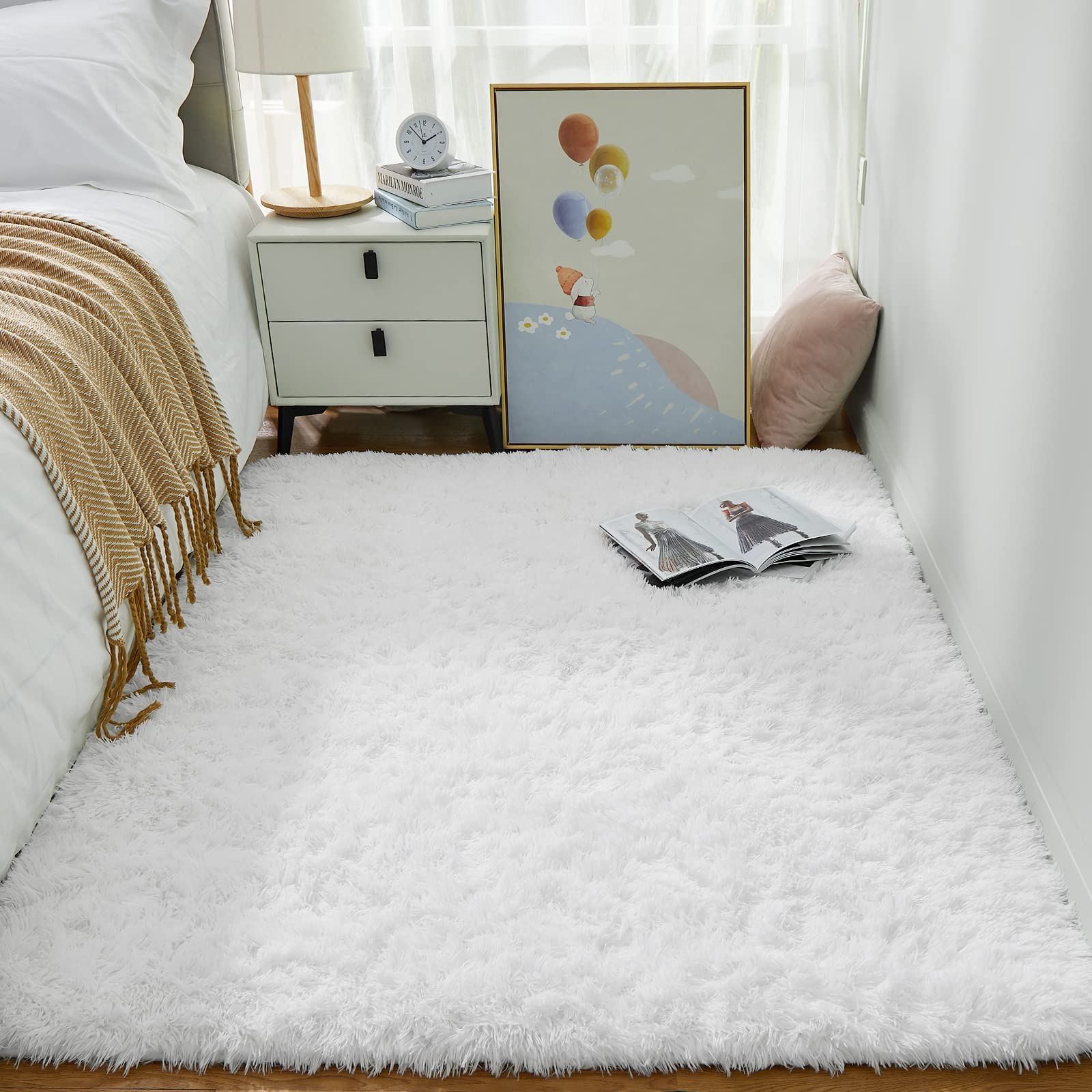 Ophanie White Rug in living room, creates inviting seating area.