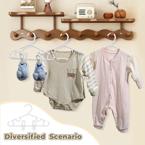 Oppeeye hanger size 10-6x5-5 inches fits baby shirts and onesies.