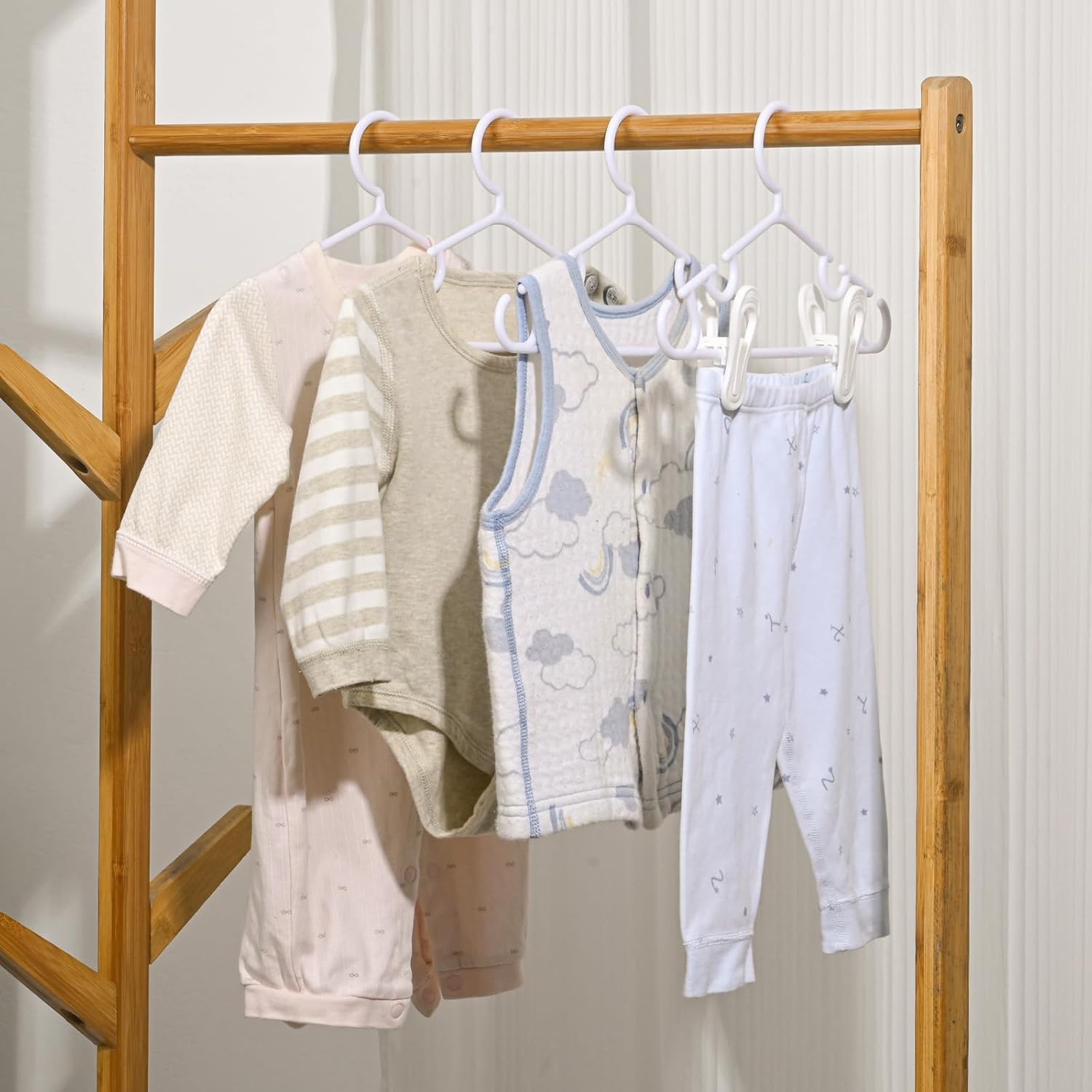 Oppeeye nursery closet organized with 20 hangers and 40 clips for easy access.