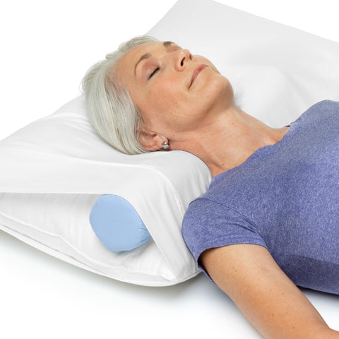 OPTP round cervical pillow close-up showing round design aiding neck alignment.