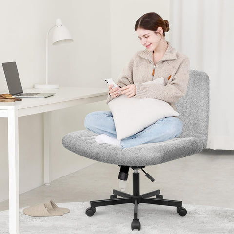 Orange Factory Criss Cross Chair seat close-up highlights plush fabric comfort.