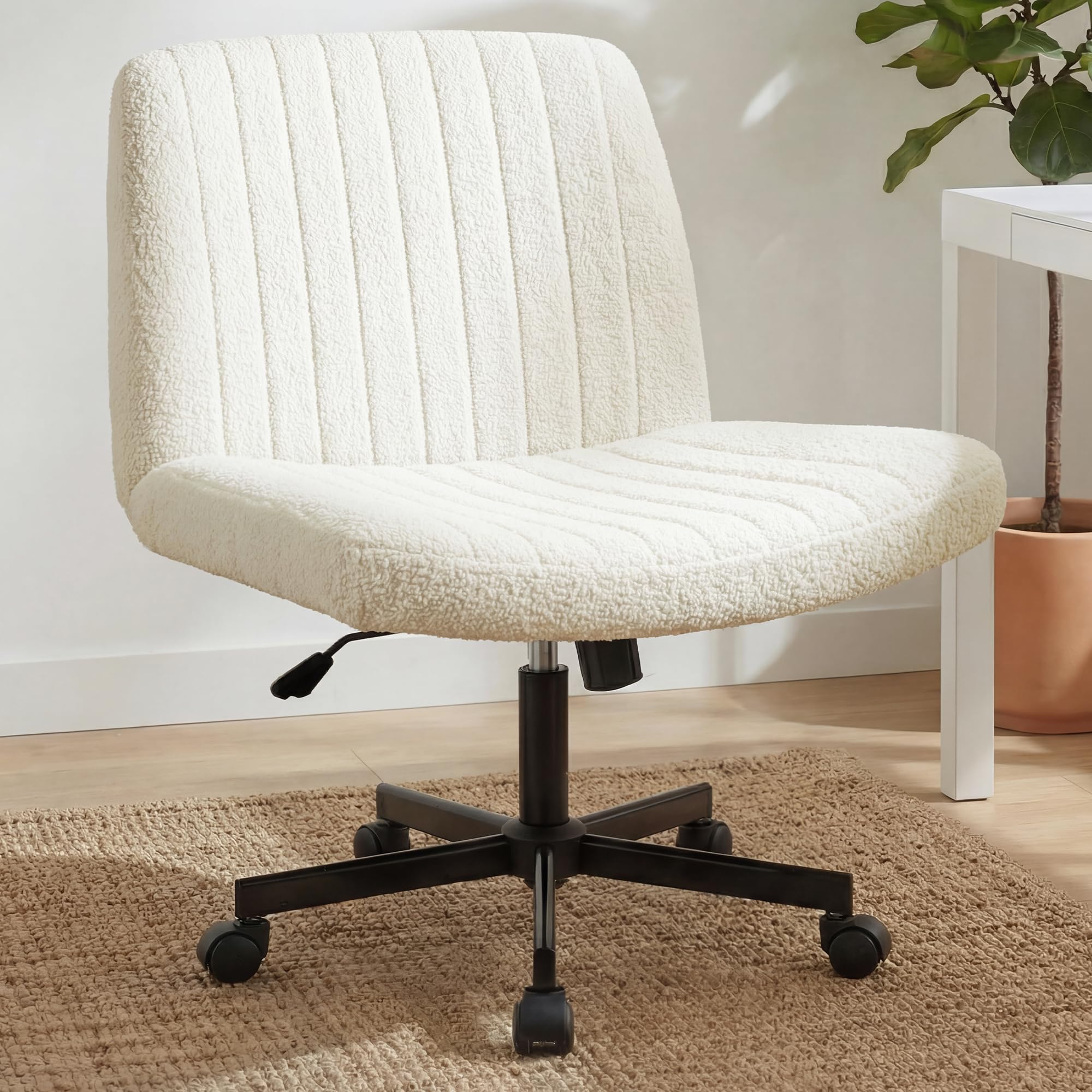 Orange Factory criss cross chair wheels with wide cross-legged seat for comfort.