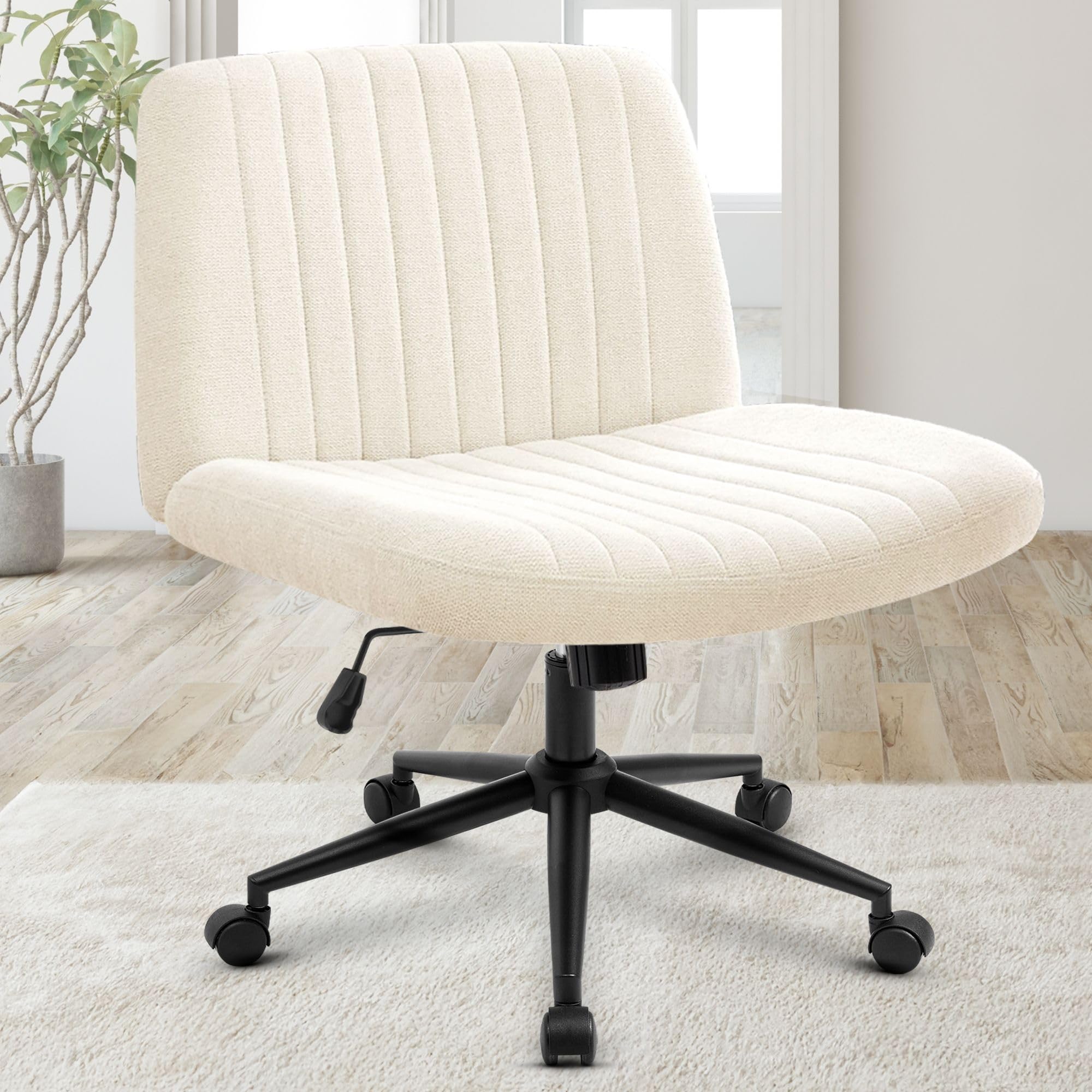 Orange Factory criss cross chair wheels enable smooth movement during desk tasks.