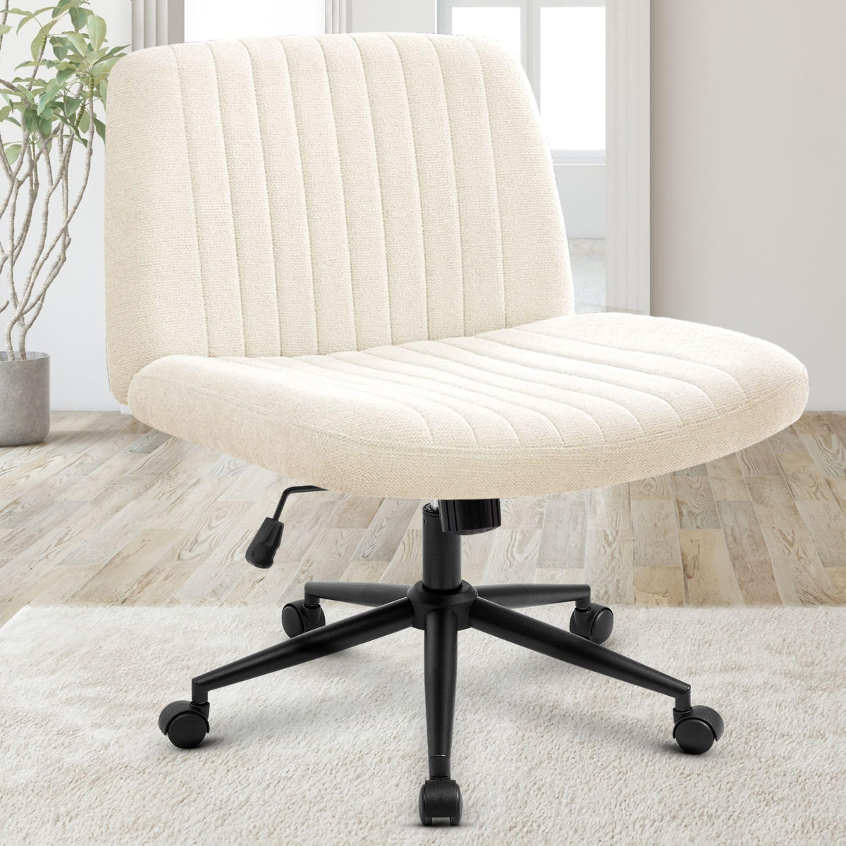Orange Factory criss cross chair wheels enable smooth movement during desk tasks.