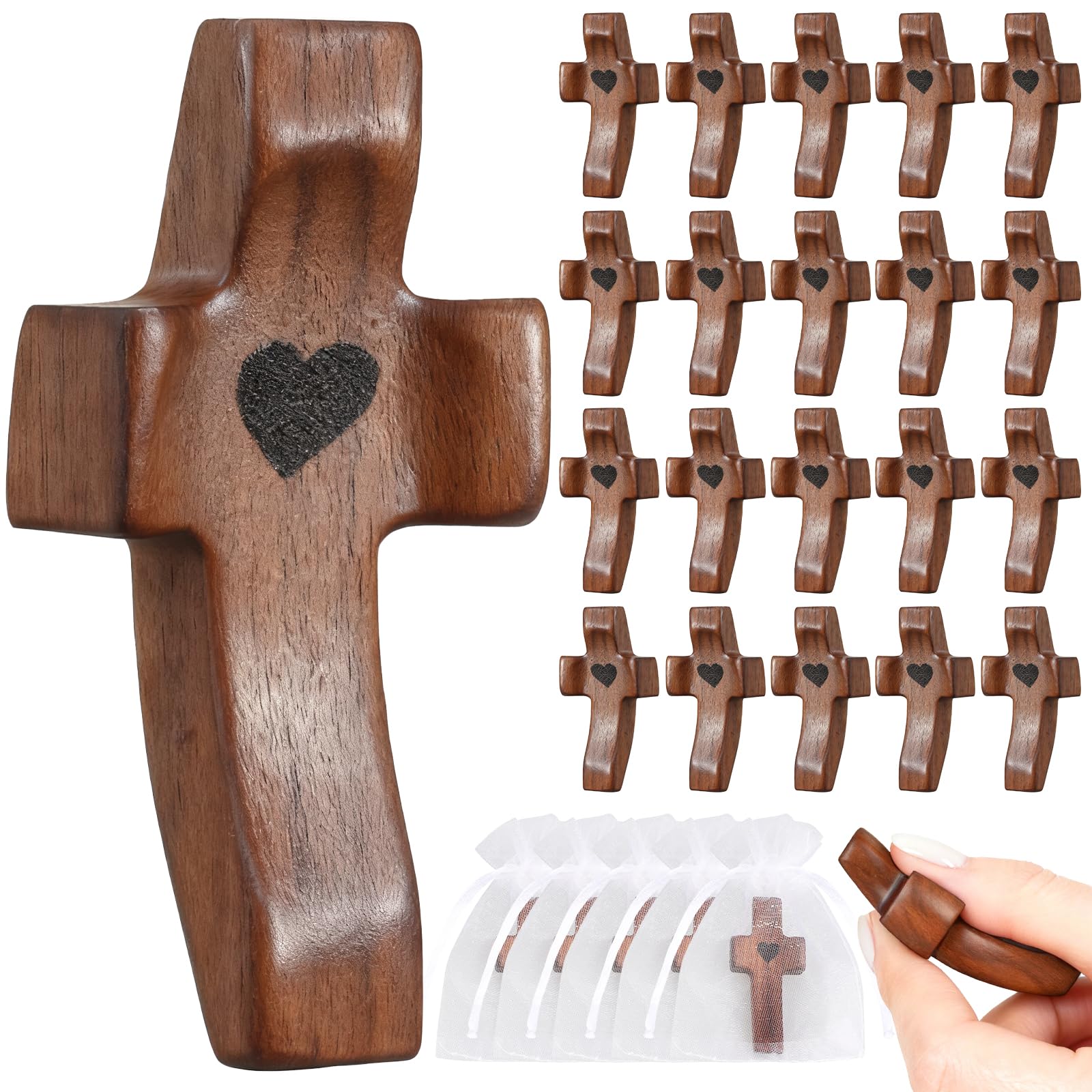 OrbitShell Heart Cross close-up on warm walnut wood for pocket devotion.