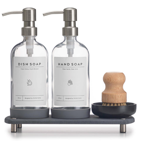 ORCHID HOME kitchen soap dispenser with clear glass bottle for a chic, organized sink.