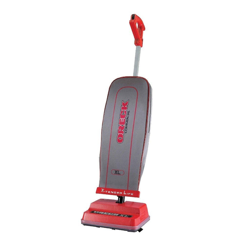 Oreck Commercial upright bagged vacuum cleaner with balance double-helix brush removing embedded dirt on carpets.