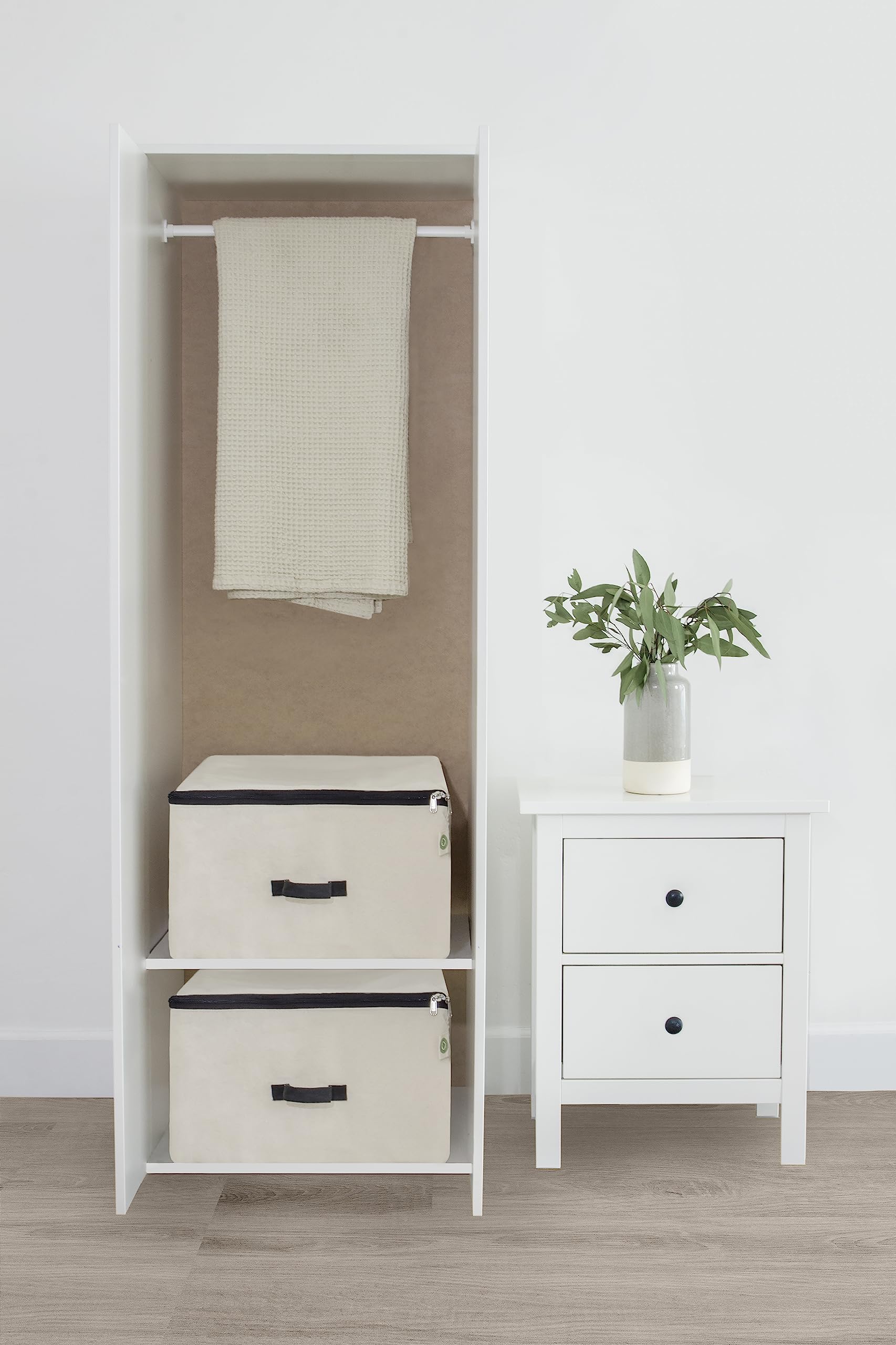 Stacked Organic Cotton Mart bags in a closet for organization.