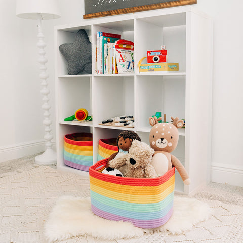 OrganiHaus rainbow baskets in a nursery create bright tidy storage.