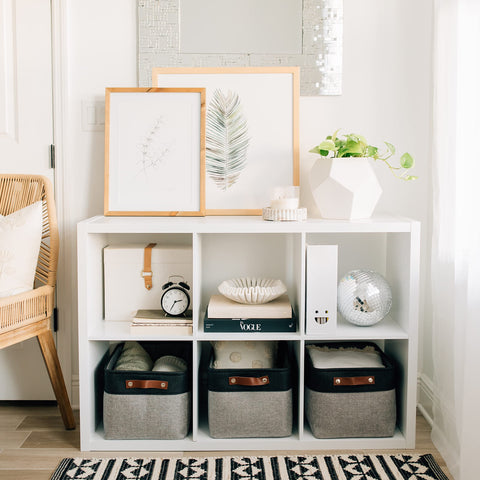 OrganiHaus organized closet using structured vegan-leather handles for easy pulling.
