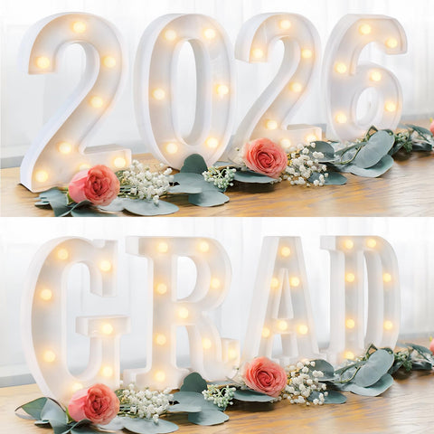 Oriental Cherry PROM 2026 LED letters sign lighting up a graduation backdrop