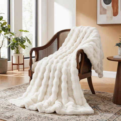 ORINOVA Light Beige Cozy Faux Fur Throw in living room setup for stylish warmth.