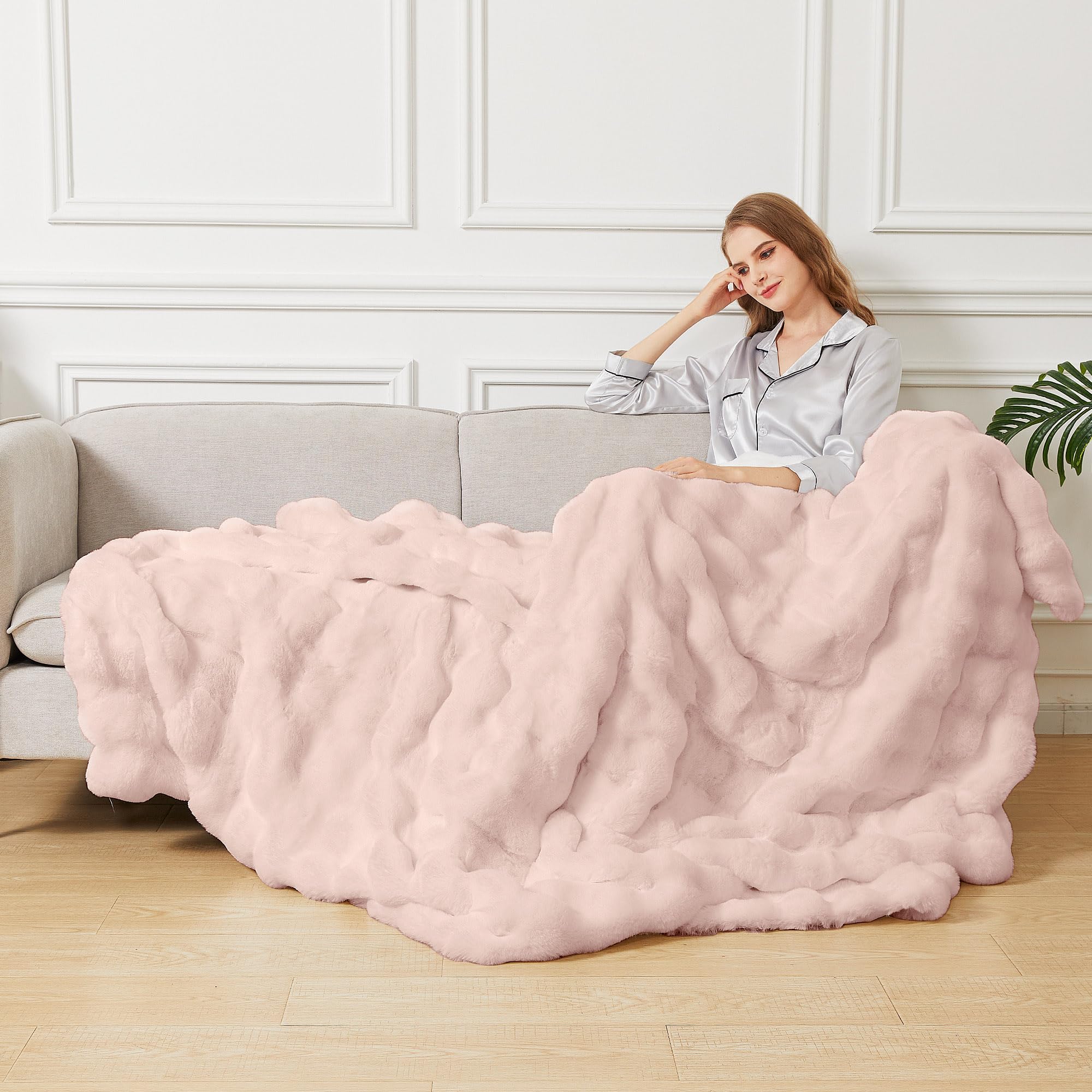 ORINOVA pink fluffy blanket closeup fur texture enhances softness and comfort