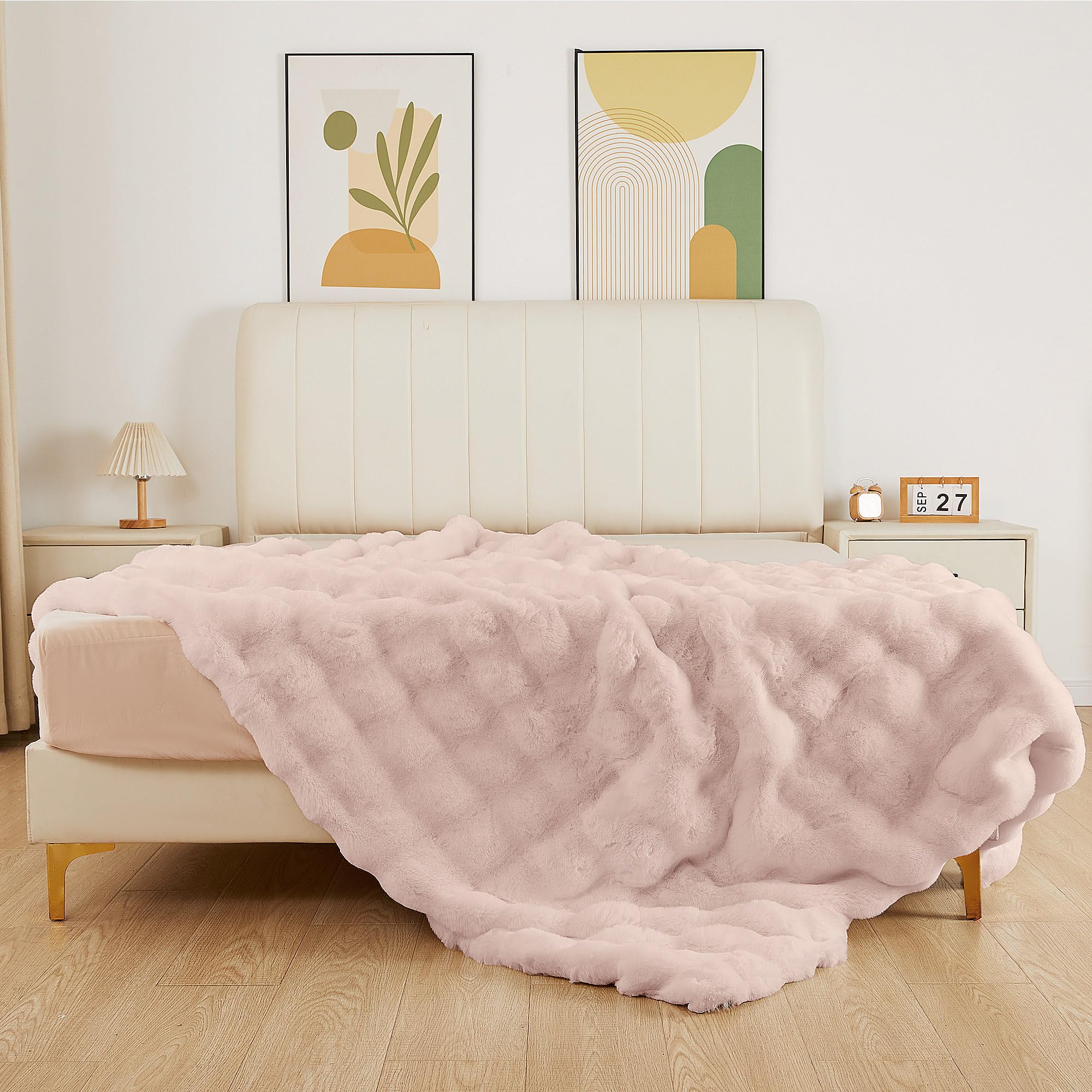 ORINOVA pink fluffy blanket folded shows compact, lightweight warmth for any room