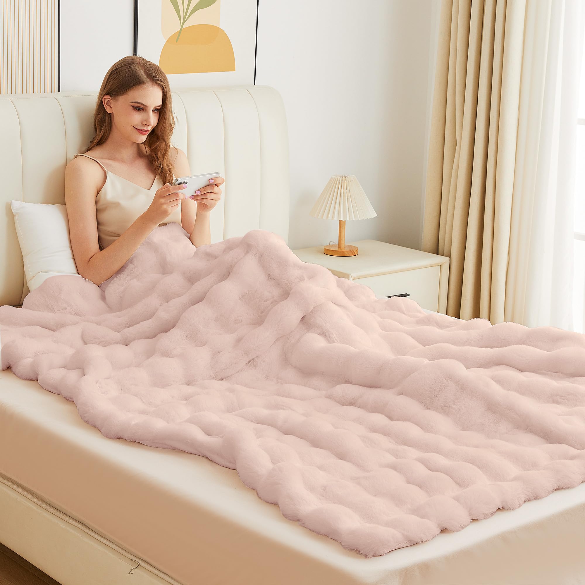 ORINOVA pink fluffy blanket on bed showcases generous 50x60 size