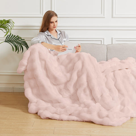 ORINOVA pink fluffy blanket care guide emphasizes machine wash and low tumble